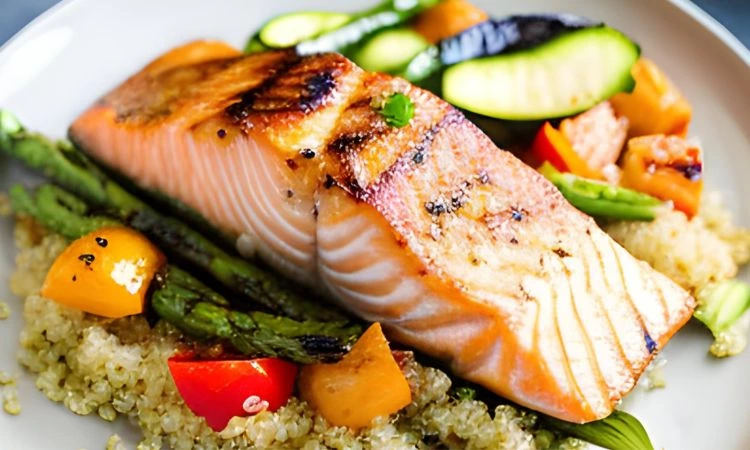 Baked Lemon Herb Salmon with Quinoa and Steamed Vegetables