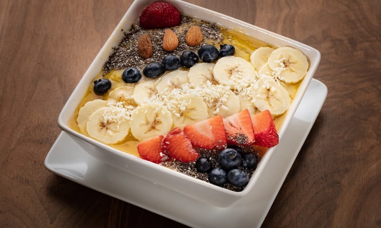 Smoothie bowl with fruits and nuts